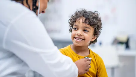 A child getting a check-up at the doctors