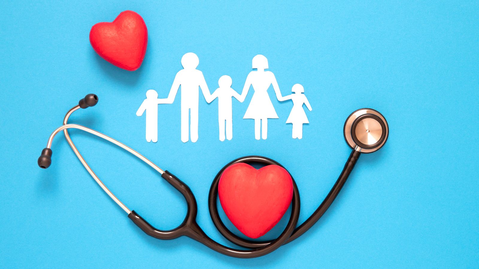 image of a stethscope, a heart and a paper cut out family