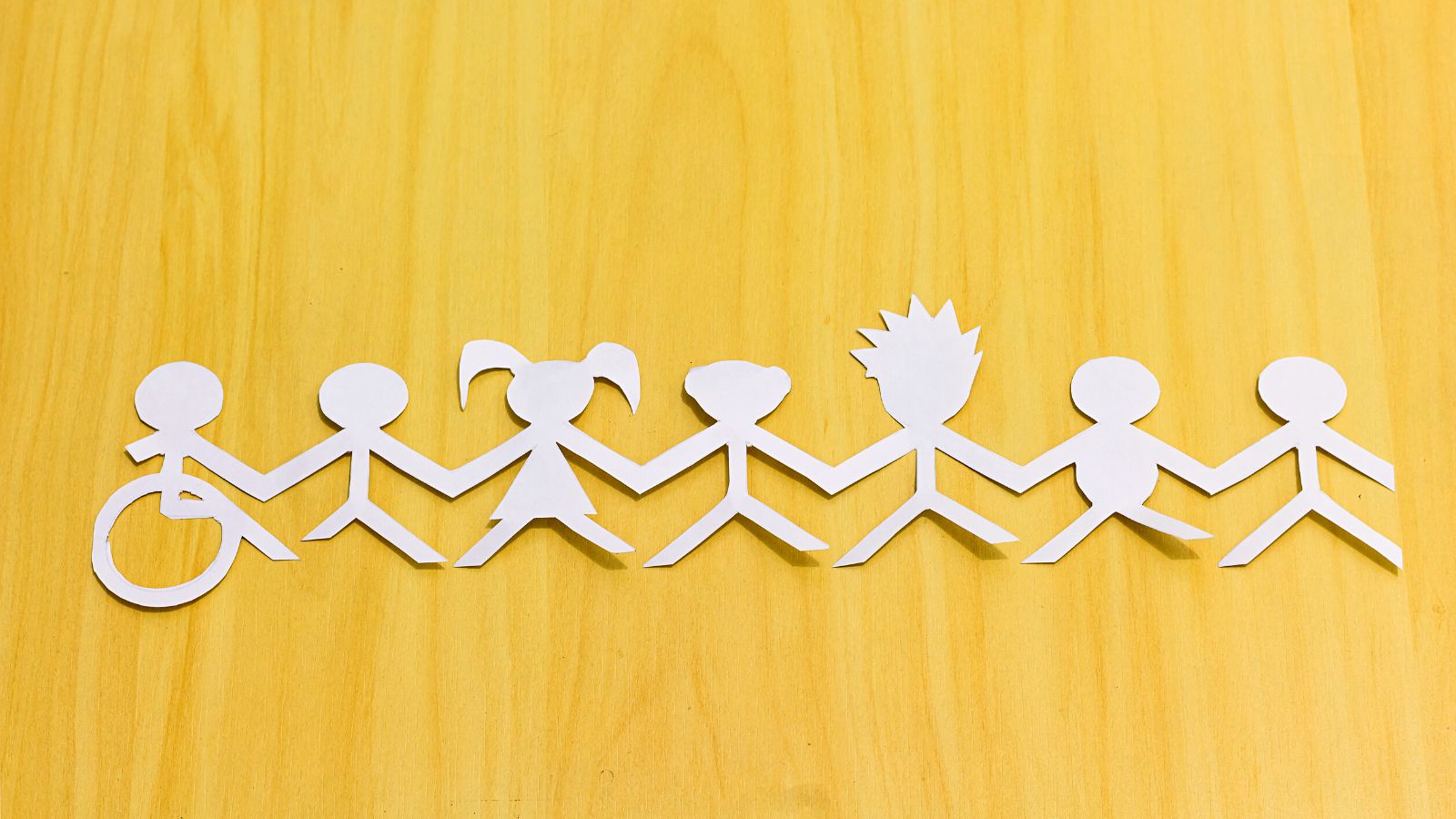 paper chain people, including one in a wheelchair