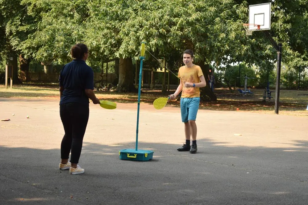 two playing tetherball