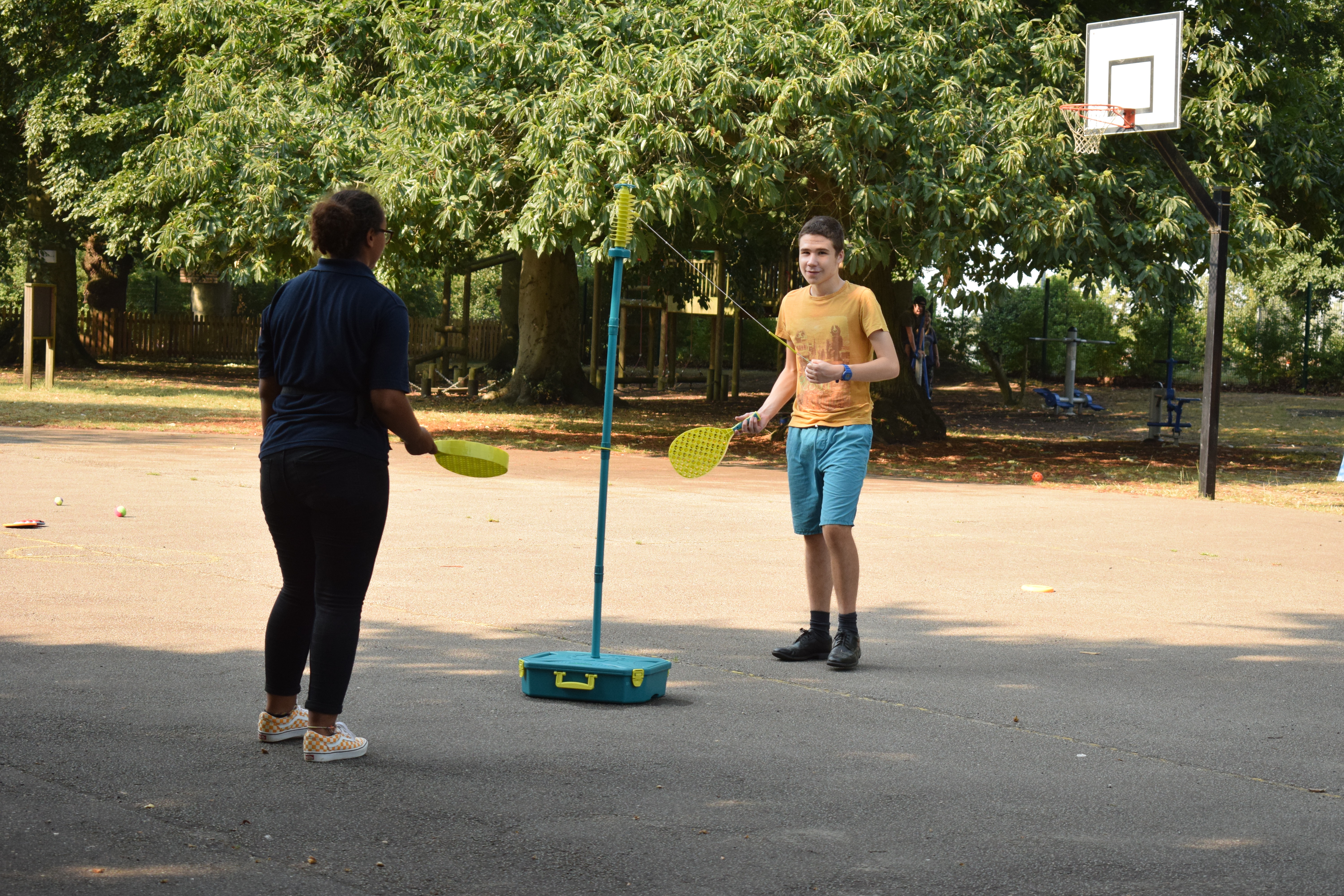 two playing tetherball