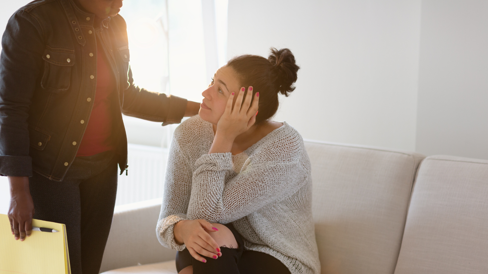 woman being consoled